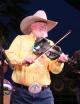 Charlie Daniels playing fiddle